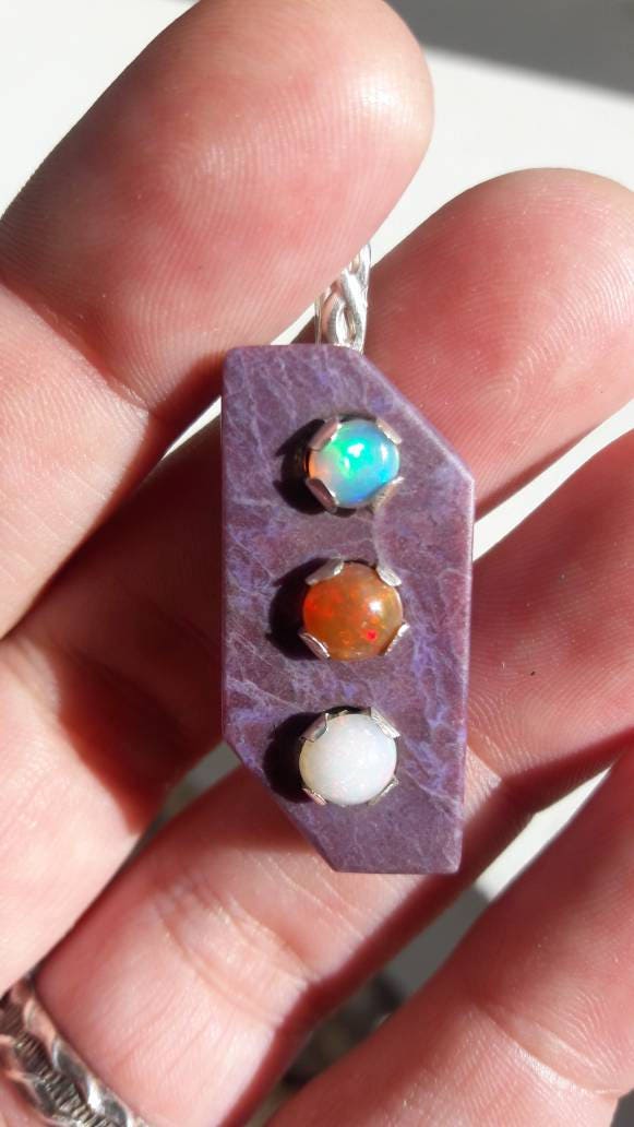 Handmade sterling silver pendant necklace with purple jade and welo opal