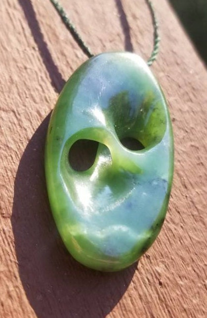 Siberian nephrite jade hand carved abstract mobius pendant