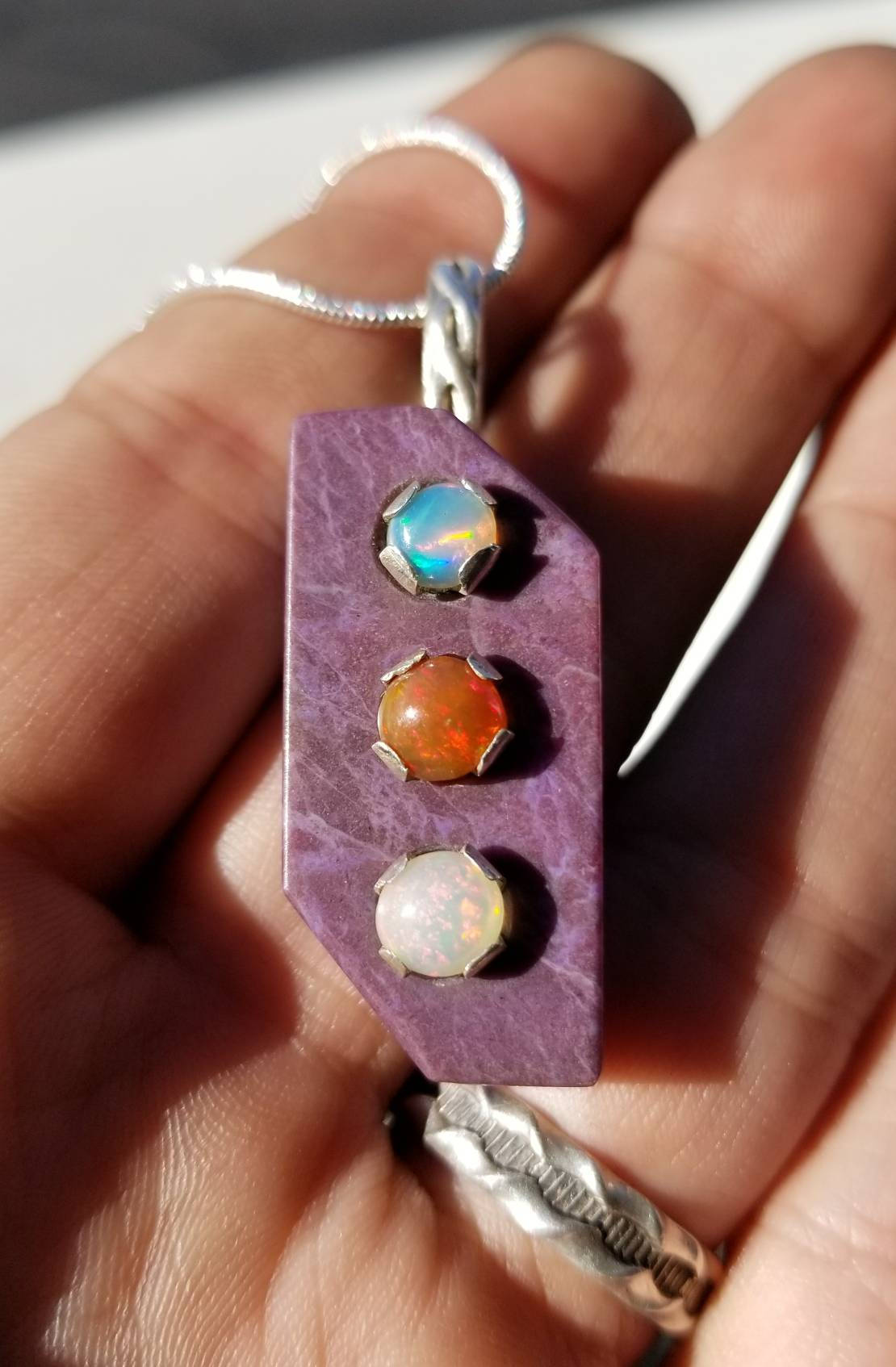 Handmade sterling silver pendant necklace with purple jade and welo opal