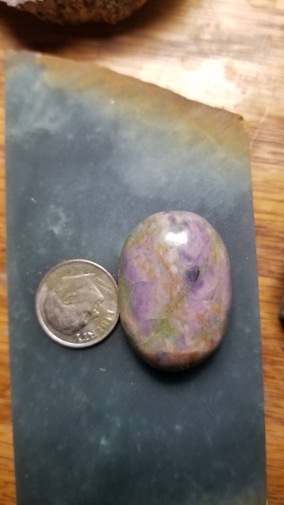 82ct UV reactive monet stone oval cabochon