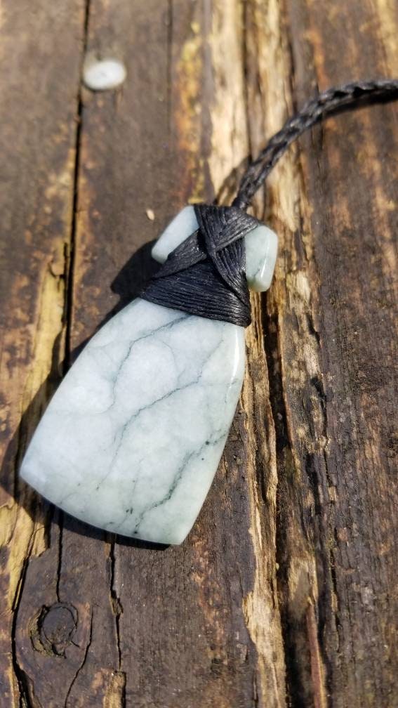 Hand carved Guatemala jadeite toki pendant on hand braided adjustable cord