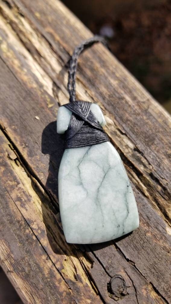 Hand carved Guatemala jadeite toki pendant on hand braided adjustable cord