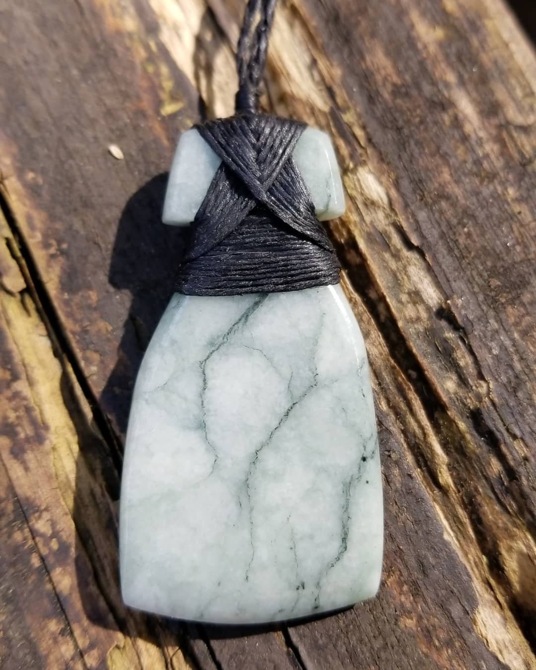 Hand carved Guatemala jadeite toki pendant on hand braided adjustable cord