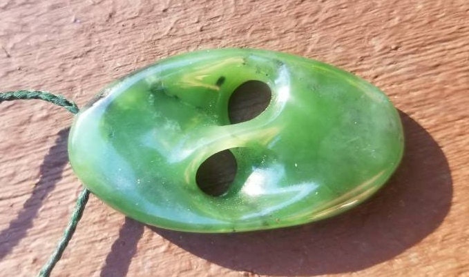 Siberian nephrite jade hand carved abstract mobius pendant