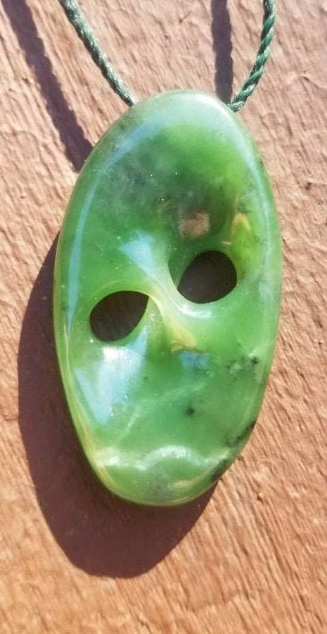 Siberian nephrite jade hand carved abstract mobius pendant