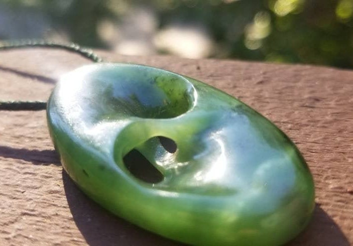 Siberian nephrite jade hand carved abstract mobius pendant