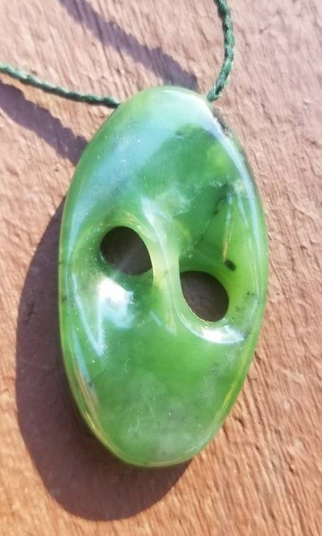 Siberian nephrite jade hand carved abstract mobius pendant