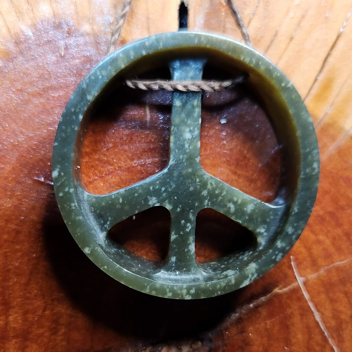Wyoming black olive nephrite jade hand carved peace sign adjustable pendant