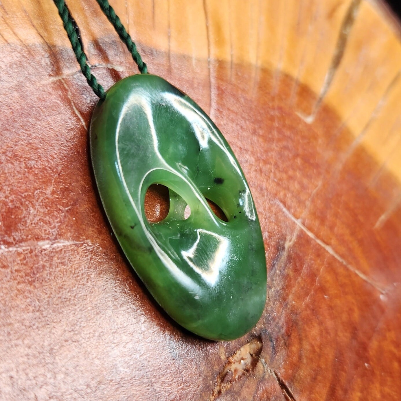 Siberian nephrite jade hand carved abstract mobius pendant