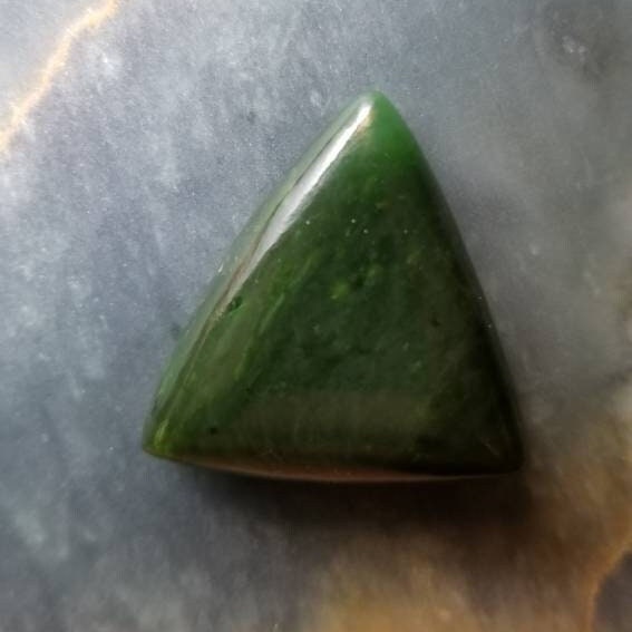 36.5ct Siberian nephrite jade triangle cabochon