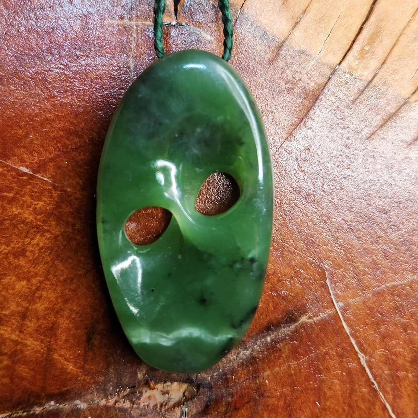 Siberian nephrite jade hand carved abstract mobius pendant