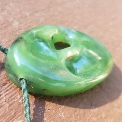 Siberian nephrite jade hand carved abstract mobius pendant