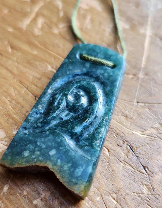 Guatemala princessa olmec blue jadeite live edge flower sprout pendant