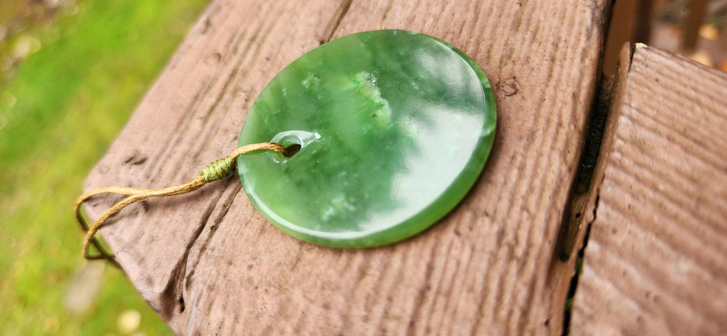 BC nephrite jade disc pendant
